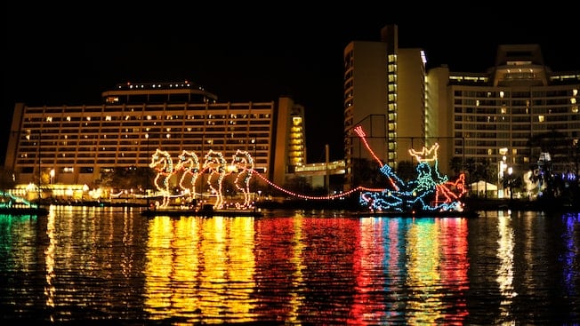 The Electrical Water Parade sails past Disney's Contemporary Resort.