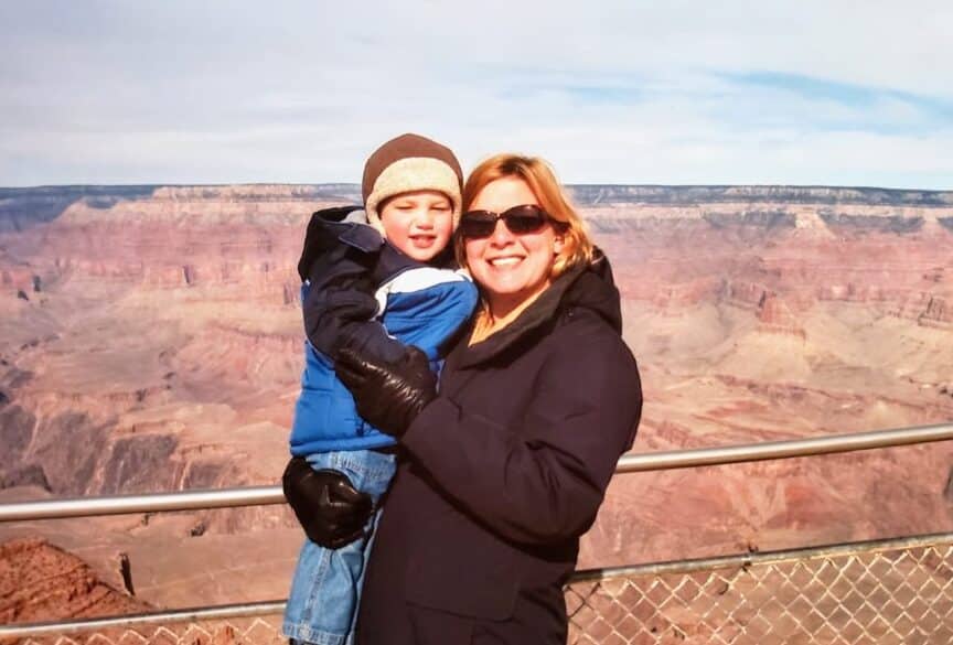 Standing in front of the Grand Canyon overlook